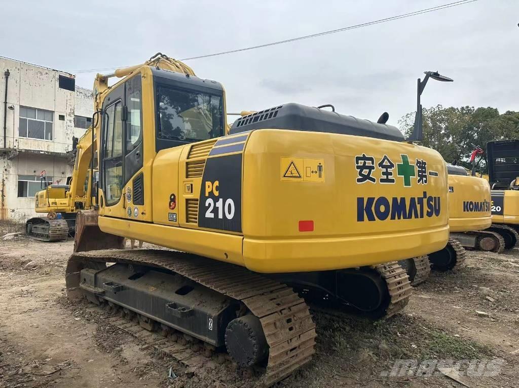 Komatsu PC 210 LC Beltegraver