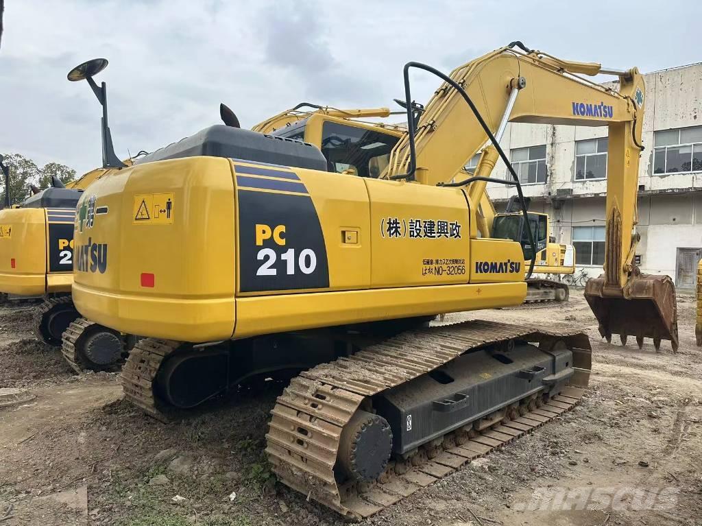 Komatsu PC 210 LC Beltegraver
