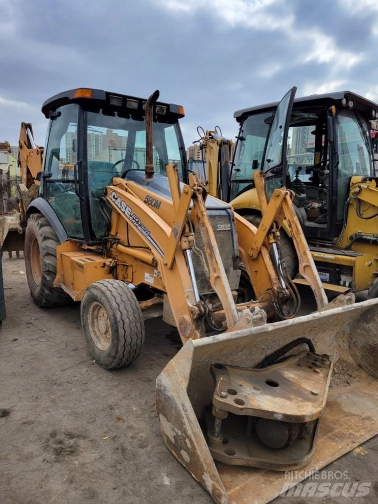 CASE 580 M Traktorgravere
