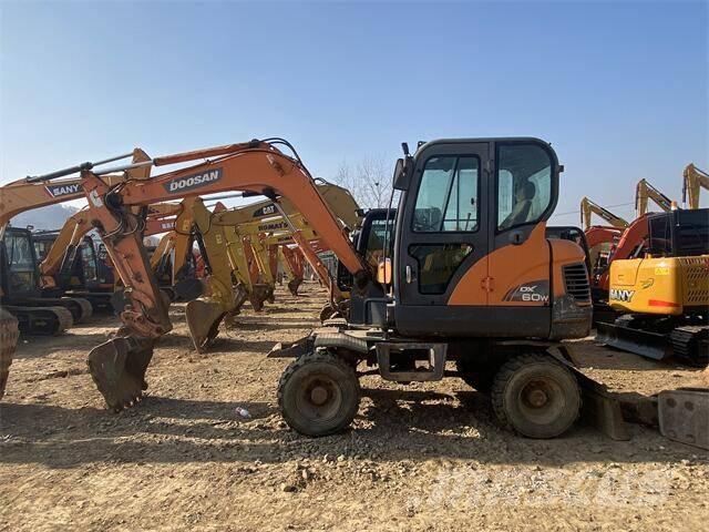Doosan DX60W Beltegraver