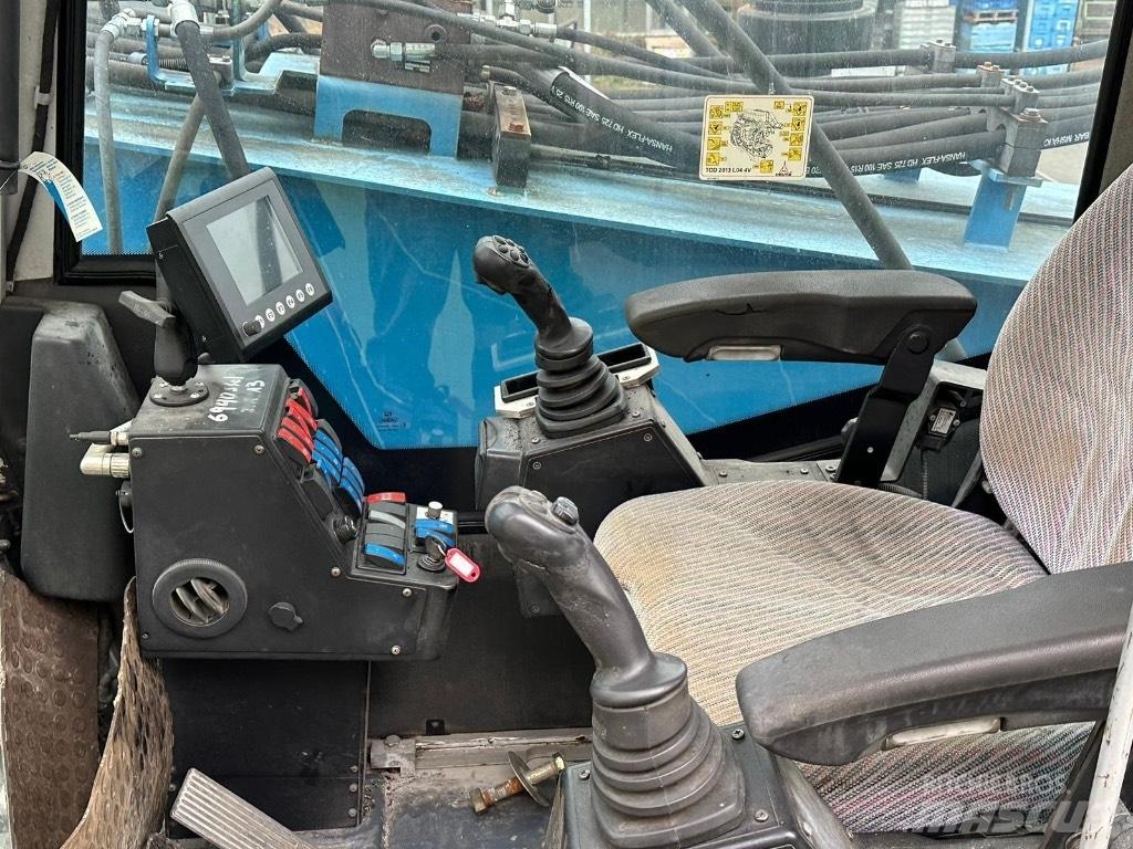 Fuchs MHL 474 Gravemaskiner for avfallshåndtering