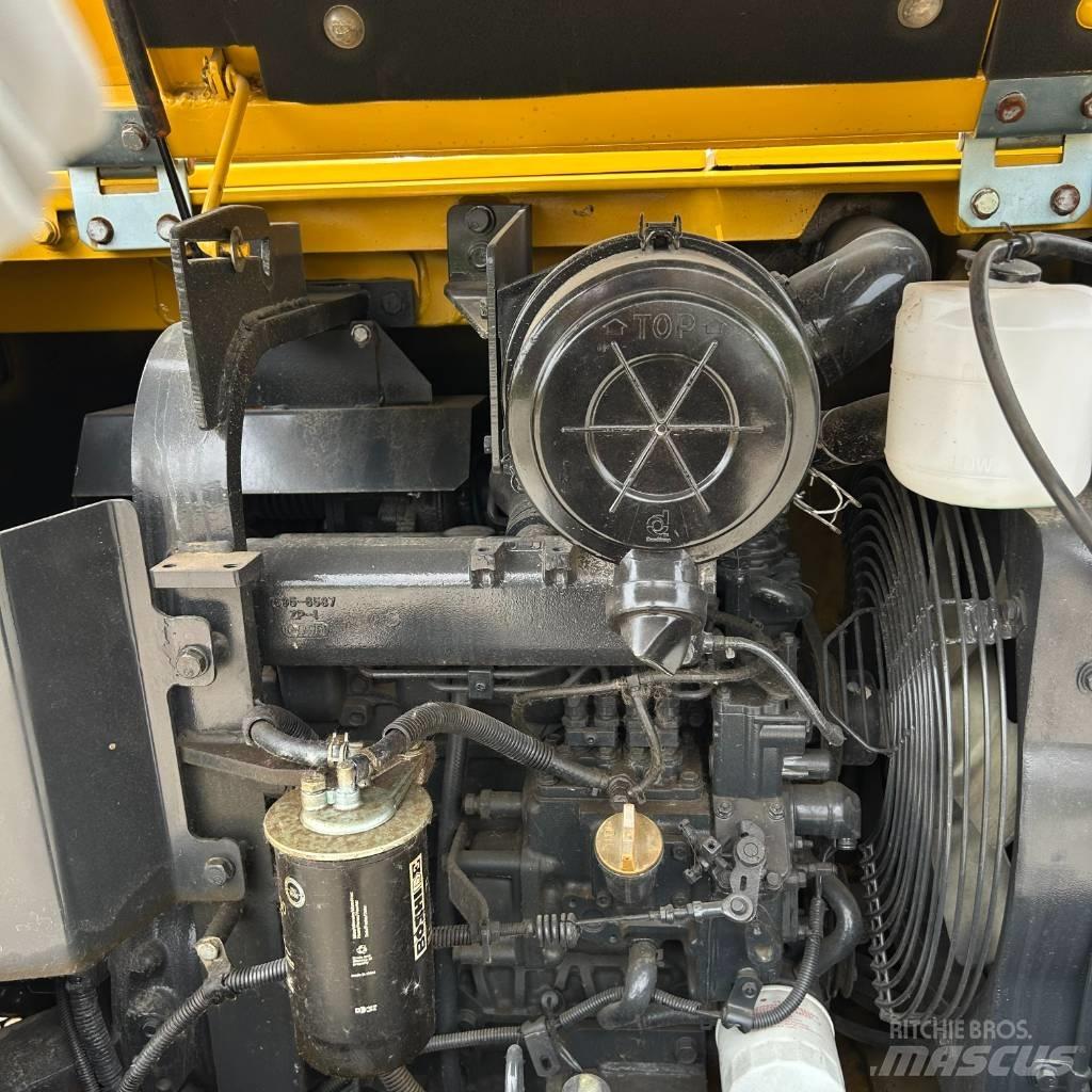 Komatsu 56-7 Beltegraver