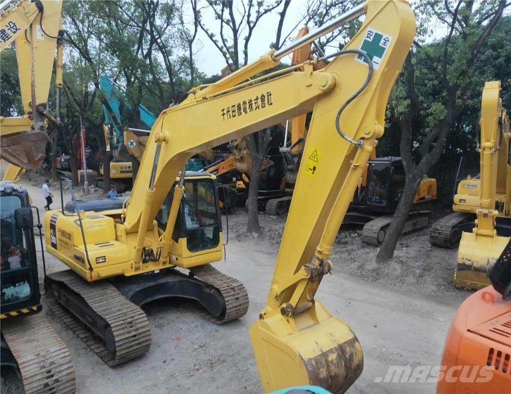 Komatsu PC200-7 Beltegraver