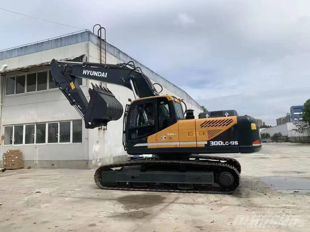 Hyundai 300-9 Beltegraver
