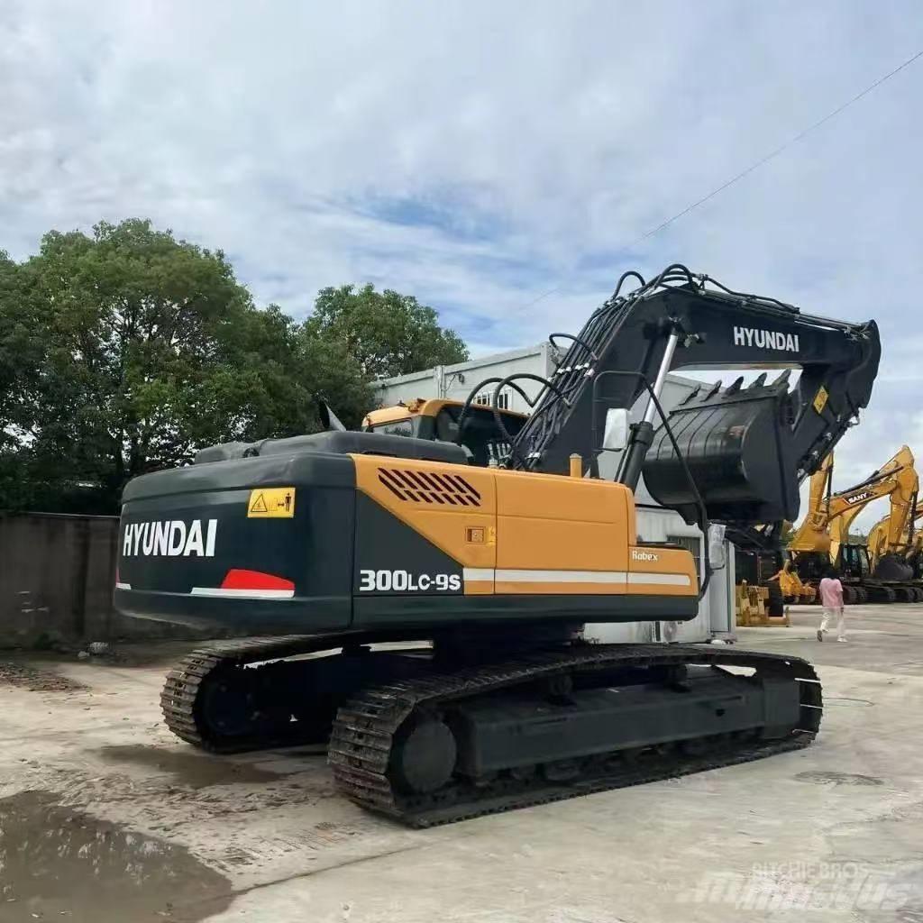 Hyundai 300-9 Beltegraver