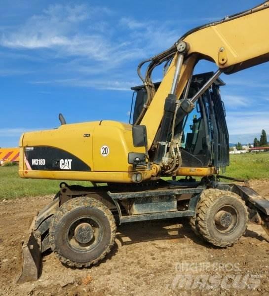 CAT M318 D Hjulgravere