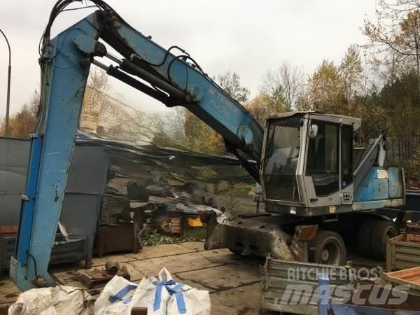 Fuchs MHL 320 Gravemaskiner for avfallshåndtering
