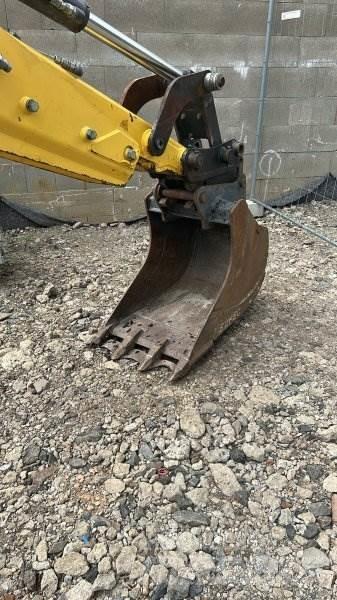New Holland B100C Traktorgravere