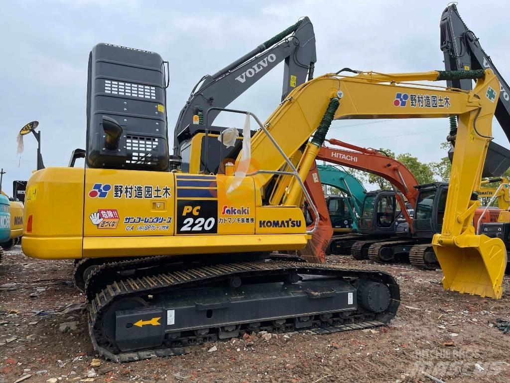 Komatsu PC 220 Beltegraver