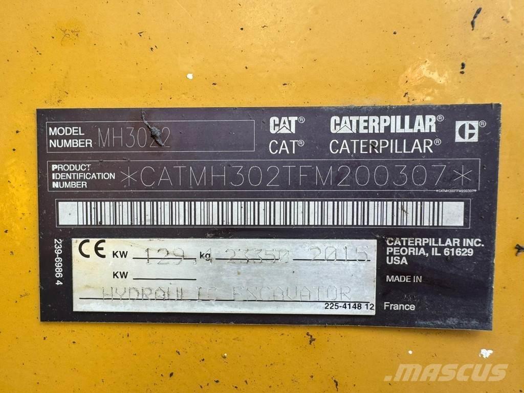 CAT MH3022 Gravemaskiner for avfallshåndtering