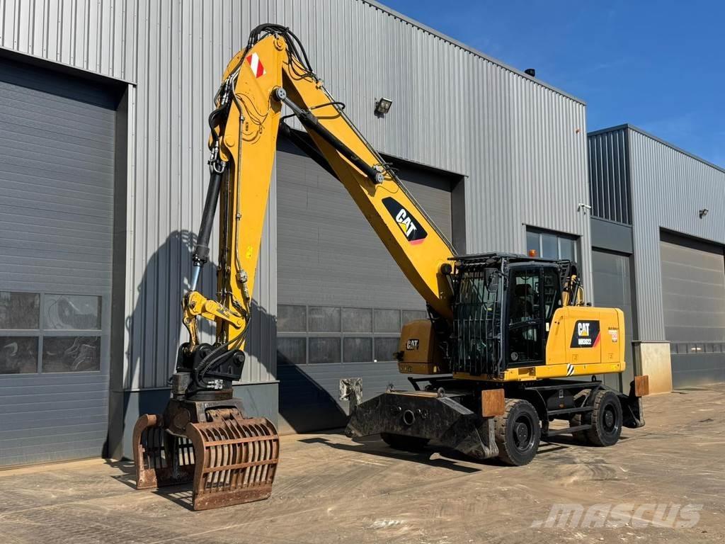 CAT MH3022 Gravemaskiner for avfallshåndtering