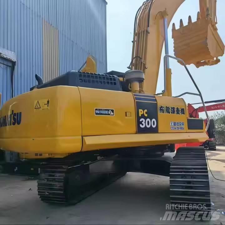 Komatsu PC300 Beltegraver