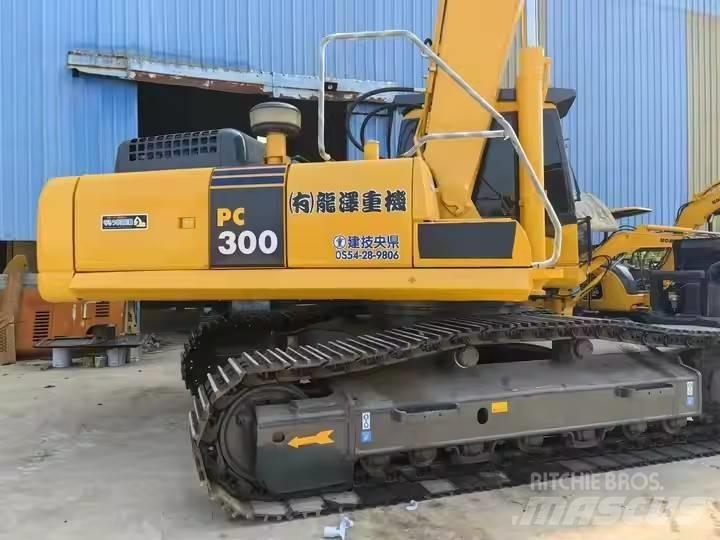 Komatsu PC300 Beltegraver