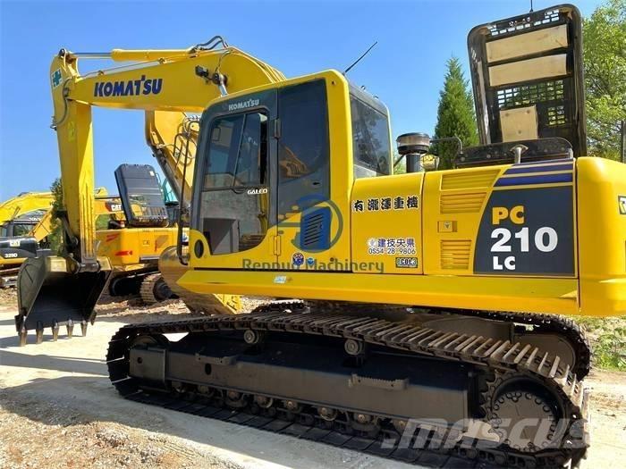Komatsu PC 210 LC Beltegraver
