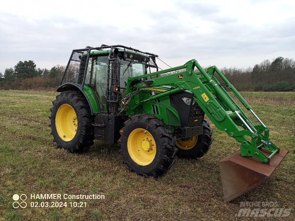 John Deere 6115M Traktor med skogsutstyr