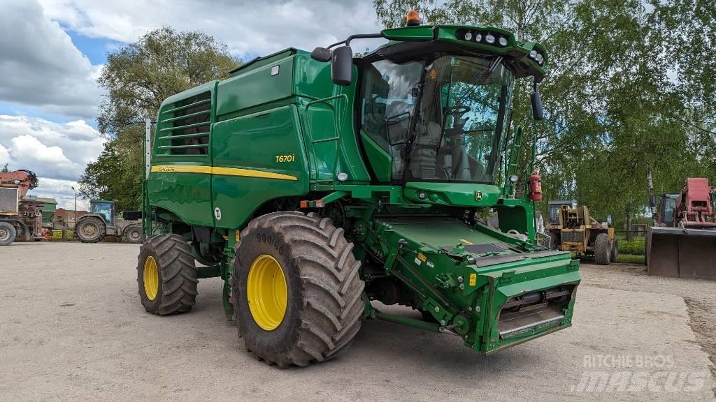 John Deere T 670 i Skurtreskere