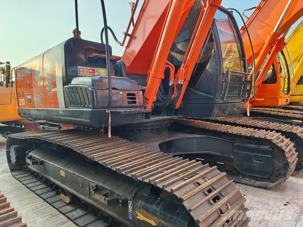 Hitachi ZX 210 Beltegraver