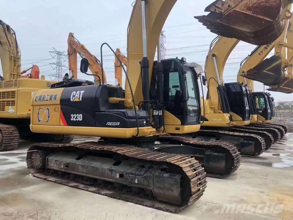 CAT 323 Beltegraver