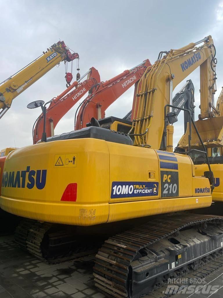 Komatsu PC210-10MO Beltegraver