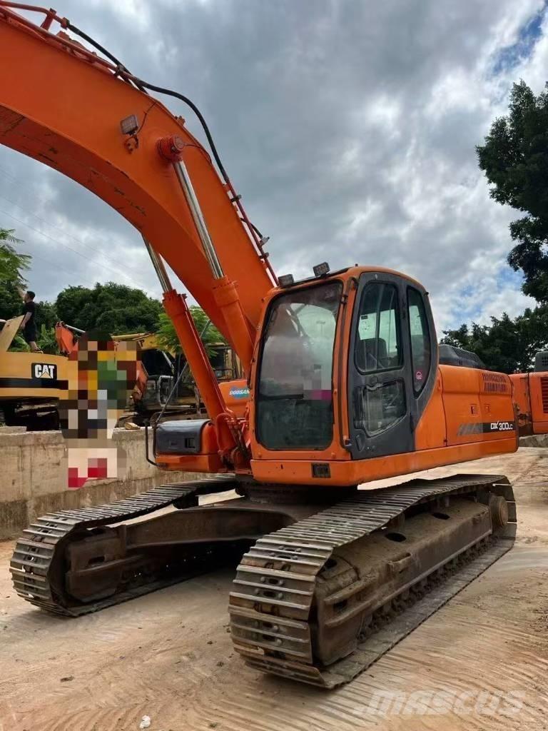 Doosan DX300LC Beltegraver