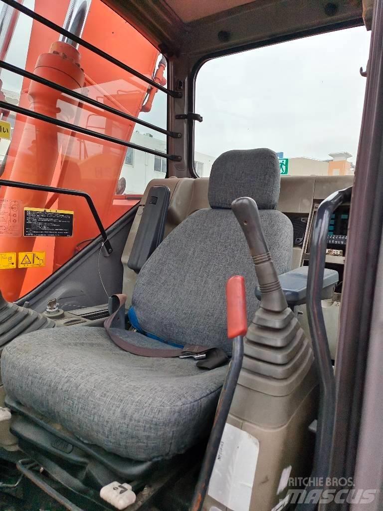 Hitachi ZX 135 US Beltegraver