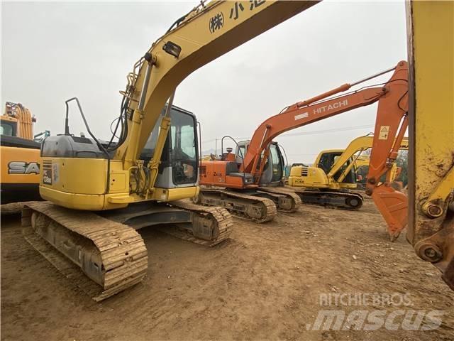 Komatsu PC138US Beltegraver