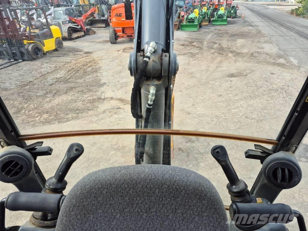John Deere 310 Traktorgravere