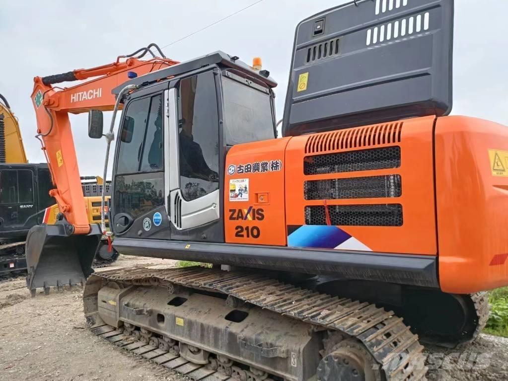 Hitachi ZX210 Beltegraver