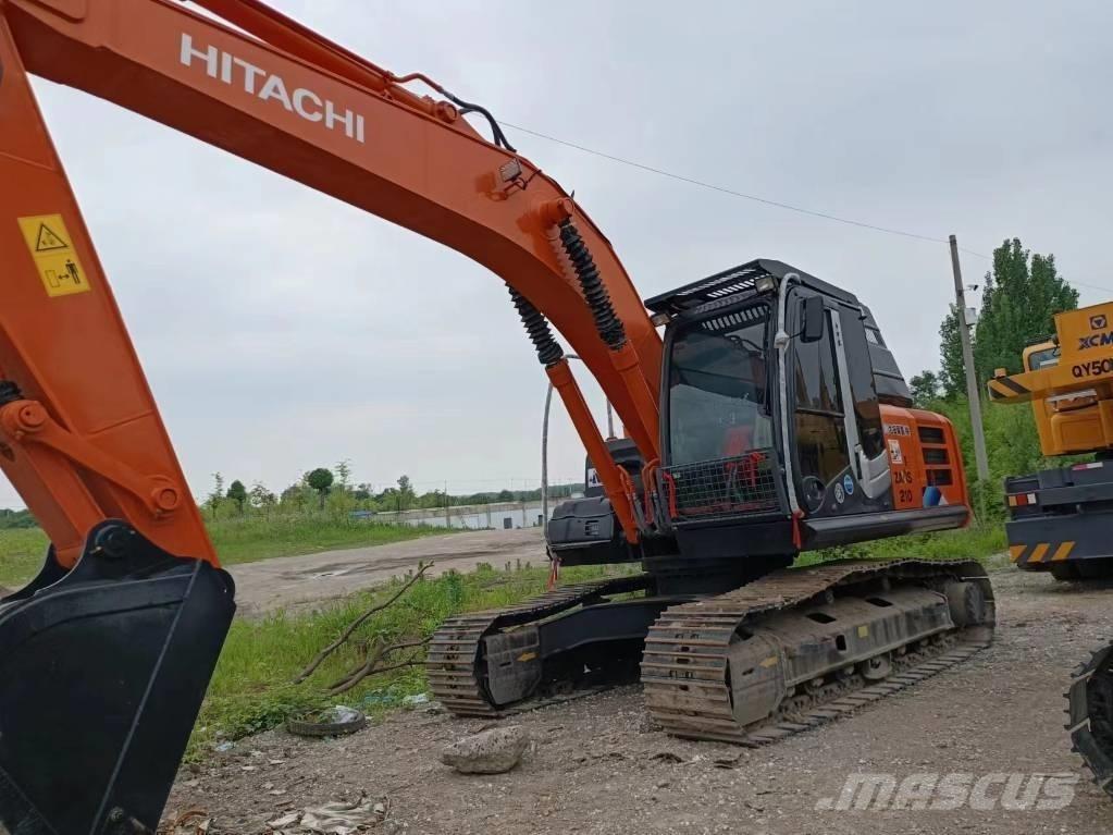 Hitachi ZX210 Beltegraver