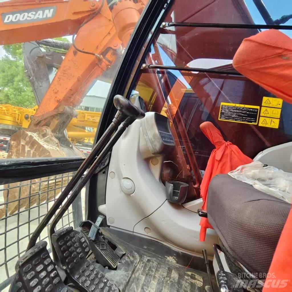 Hitachi ZX 210 Beltegraver