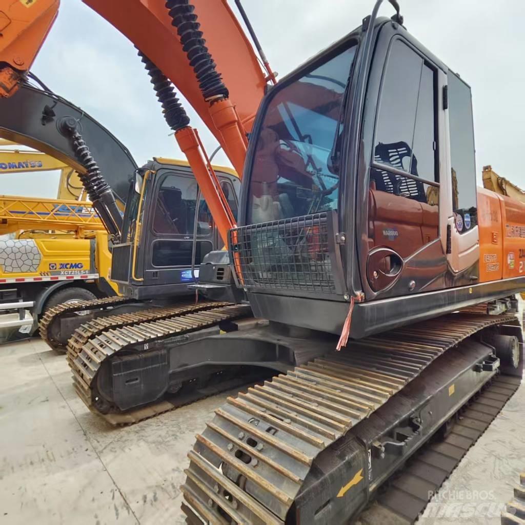 Hitachi ZX 210 Beltegraver