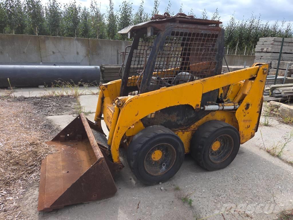 Komatsu SK 714 Kompaktlastere