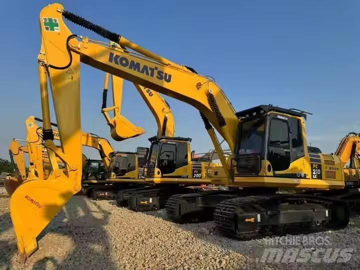 Komatsu PC210lc Beltegraver