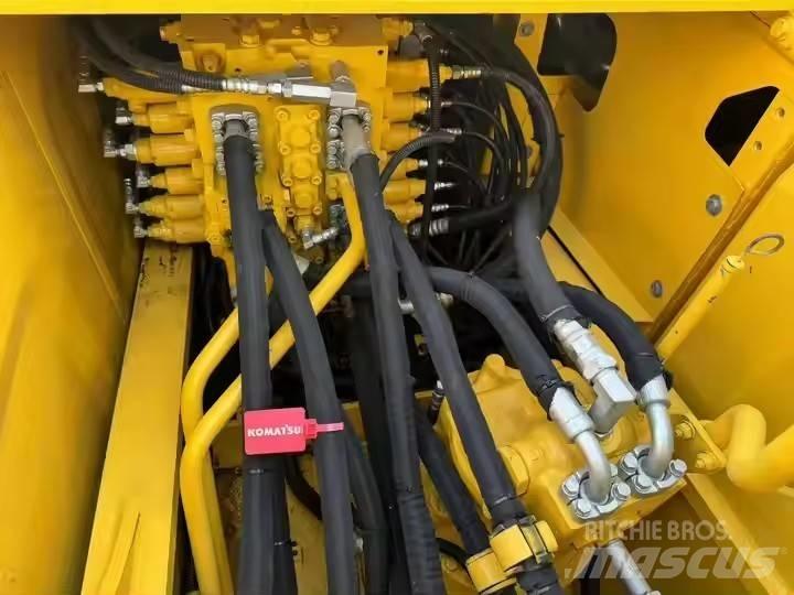 Komatsu PC210lc Beltegraver