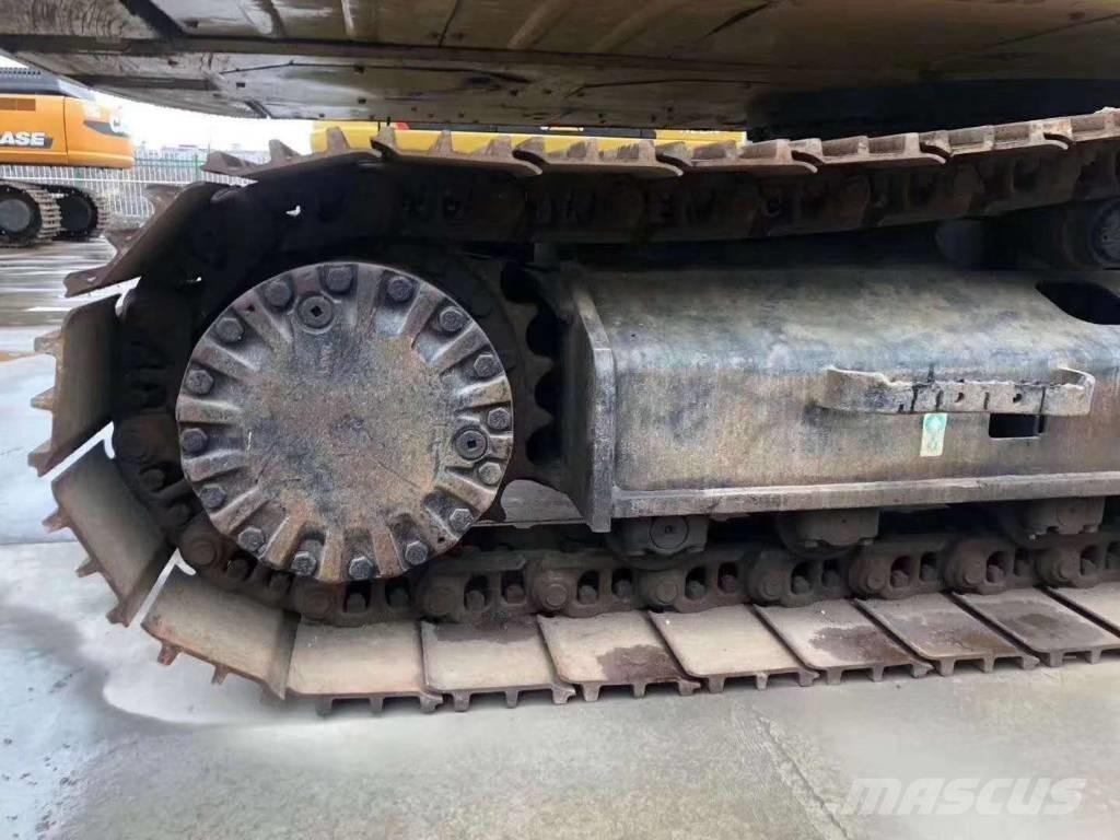 CAT 323 Beltegraver