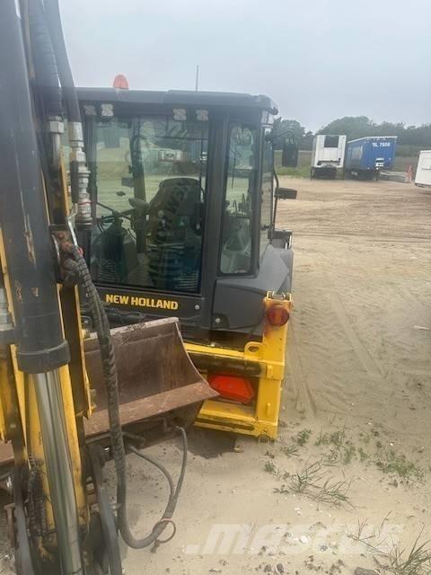 New Holland 110 D Traktorgravere