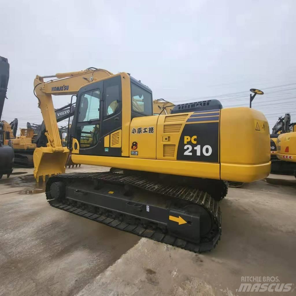 Komatsu PC 210 Beltegraver