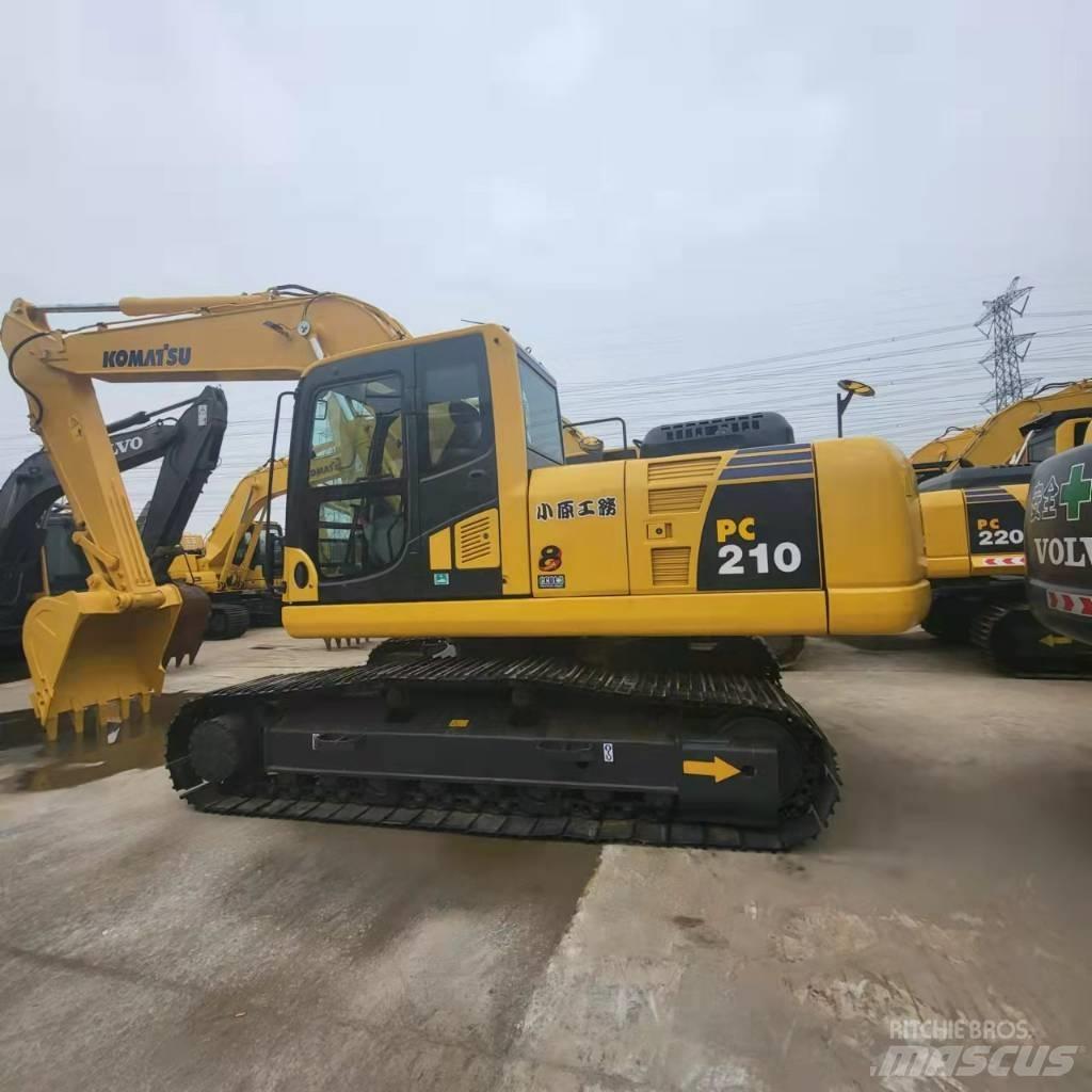 Komatsu PC 210 Beltegraver