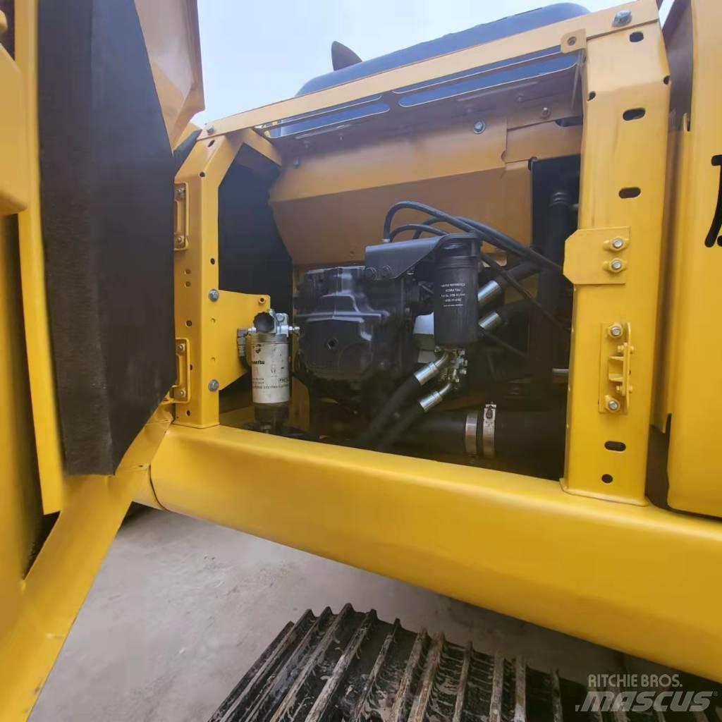 Komatsu PC 210 Beltegraver
