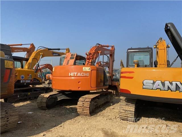 Hitachi ZX135US Beltegraver