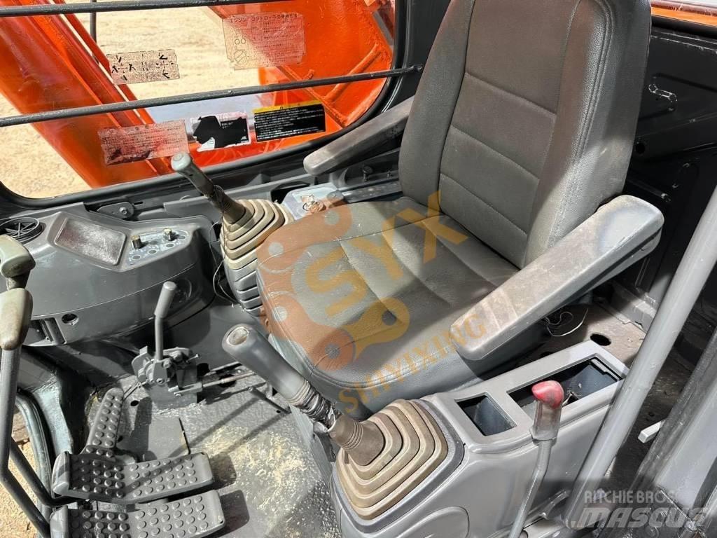 Hitachi EX 200 Beltegraver