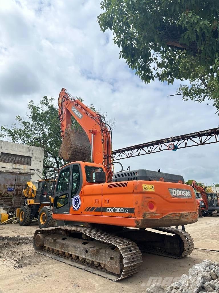 Doosan DX300 Beltegraver