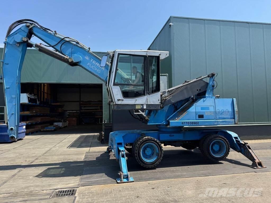 Fuchs MHL 320 Gravemaskiner for avfallshåndtering