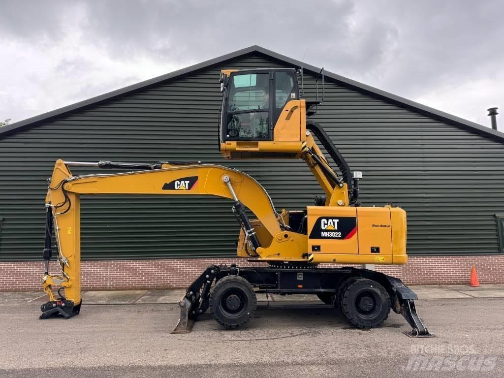 CAT MH3022 Gravemaskiner for avfallshåndtering