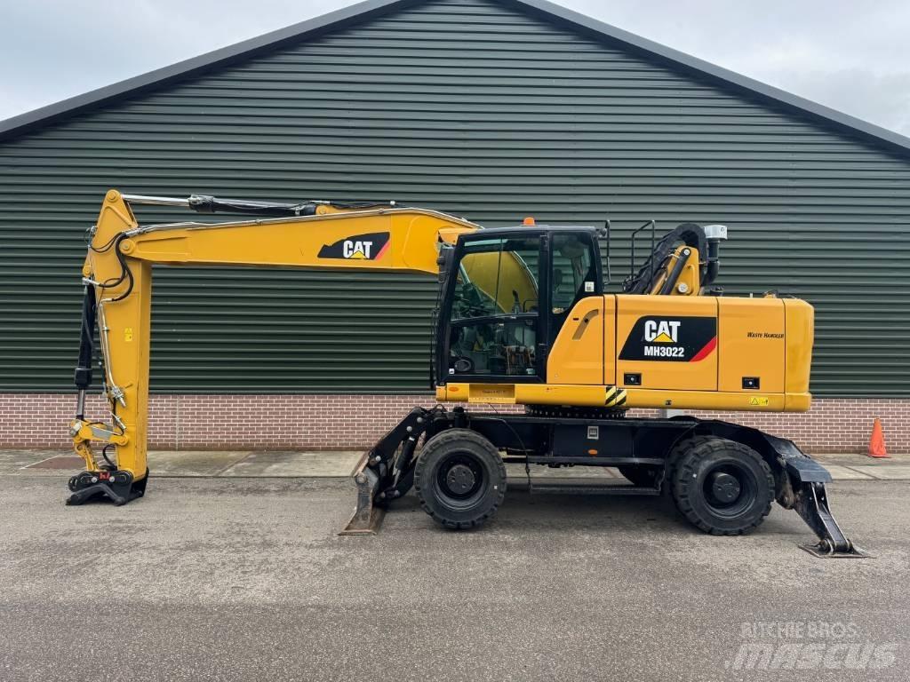 CAT MH3022 Gravemaskiner for avfallshåndtering