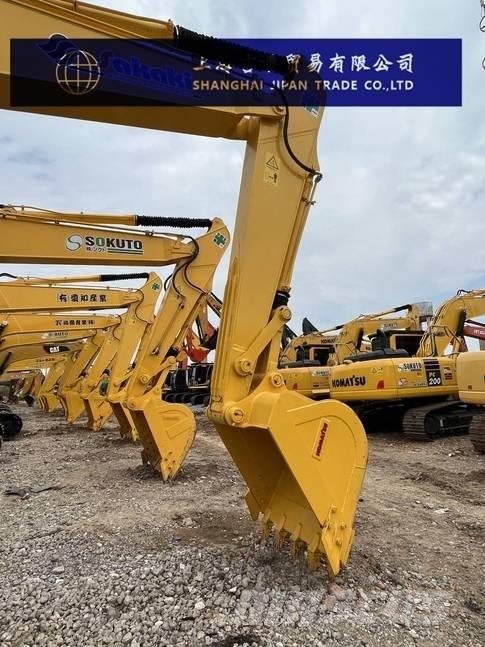 Komatsu PC 210 Beltegraver