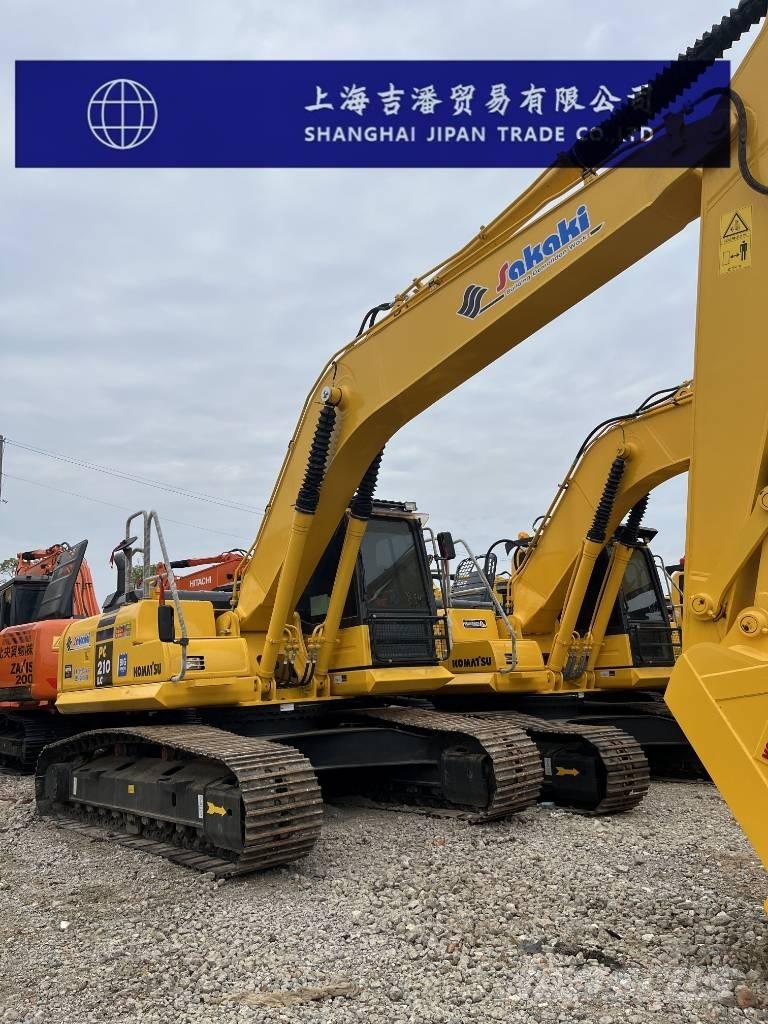 Komatsu PC 210 Beltegraver