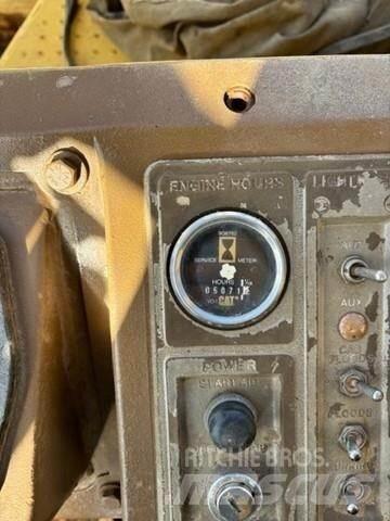 CAT 815B Avfallspresser