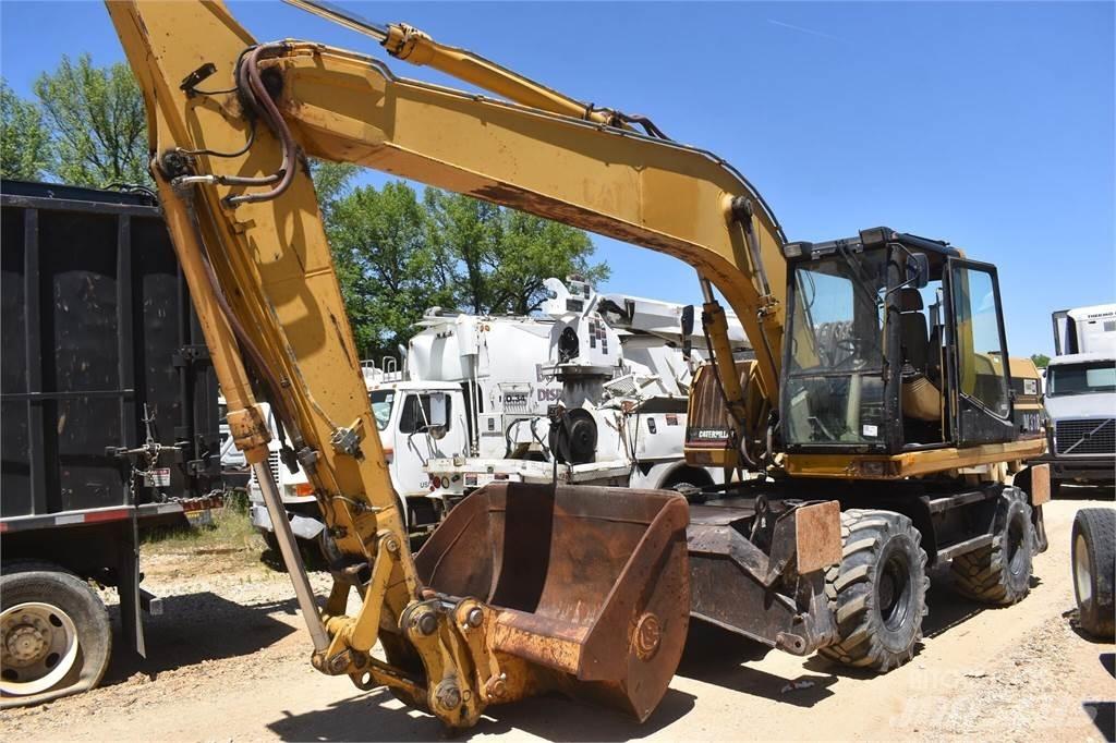 CAT M318 Hjulgravere