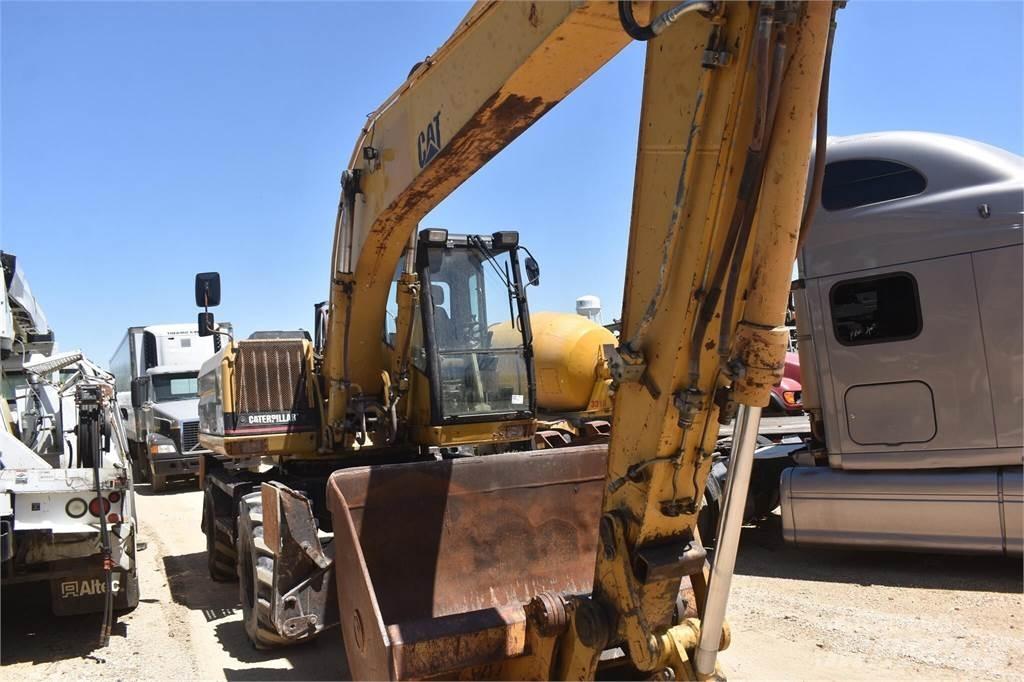 CAT M318 Hjulgravere